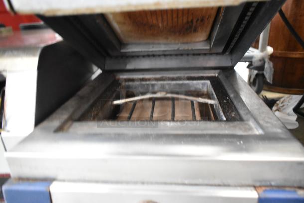 Electrolux HSPPAN metal commercial countertop panini press, open view. Used condition, 208 volts, 1 phase.