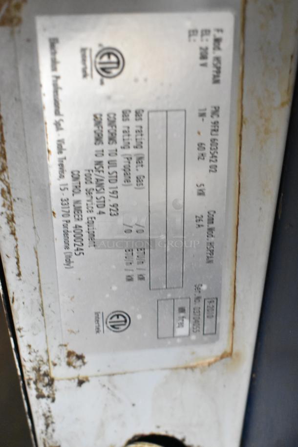 Electrolux HSPPAN Panini Press label, displaying model, electrical specifications, and standard compliance details.
