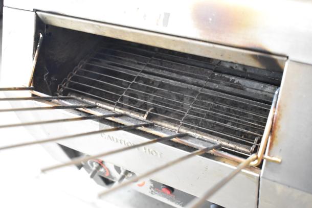 Hatco TQ-800HBA stainless steel conveyor toaster, 208V, 1 phase, worn interior, visible caution label, industrial condition.