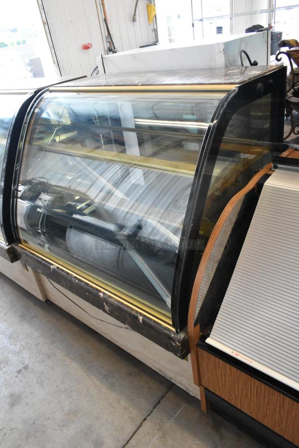 Kinco NSRM3 metal deli display case, commercial floor style, 110 volts, 1 phase, transparent glass front, good condition.