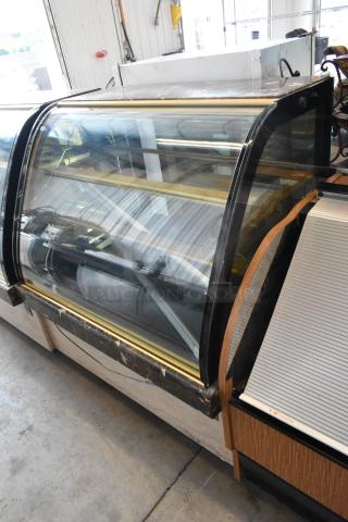 Kinco NSRM3 metal deli display case, commercial floor style, 110 volts, 1 phase, transparent glass front, good condition.