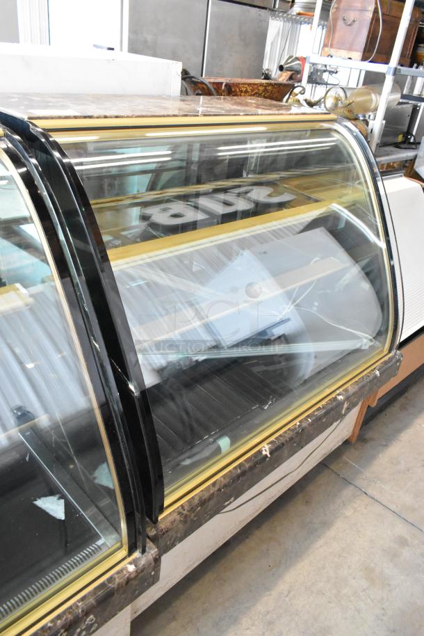 Kinco NSRM3 metal deli display case merchandiser with glass front, 110 volts, 1 phase, in used condition.