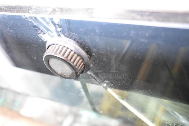Kinco NSRM3 metal deli display case, commercial floor style, 110V, 1 phase, close-up of control knob, used condition.