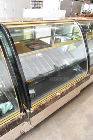 Kinco NSRM3 commercial deli display case, metal construction, glass front. Runs on 110 volts, 1 phase. Visible wear.