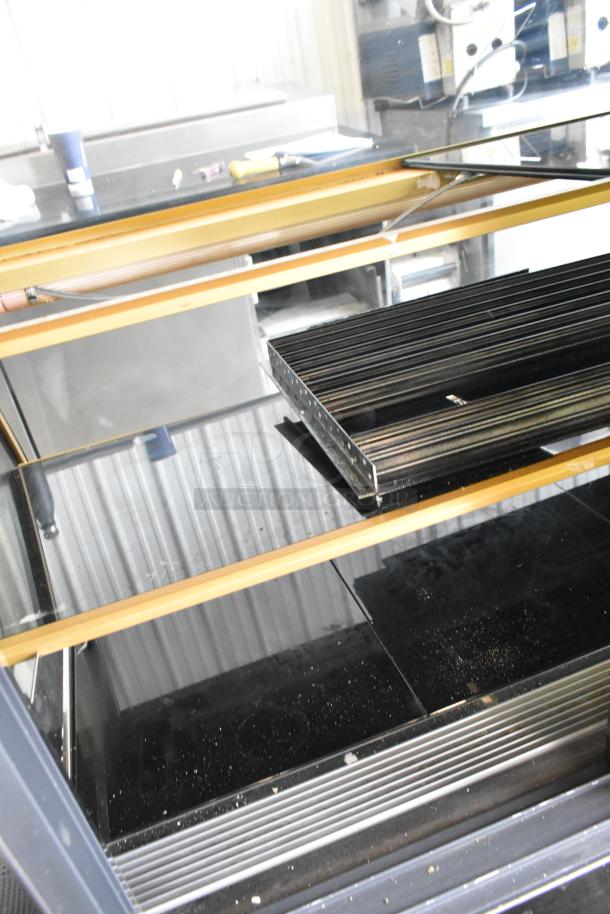 Kinco NSRM3 Metal Deli Display Case, 110V, 1 Phase, commercial floor style, glass shelves, visible wear.