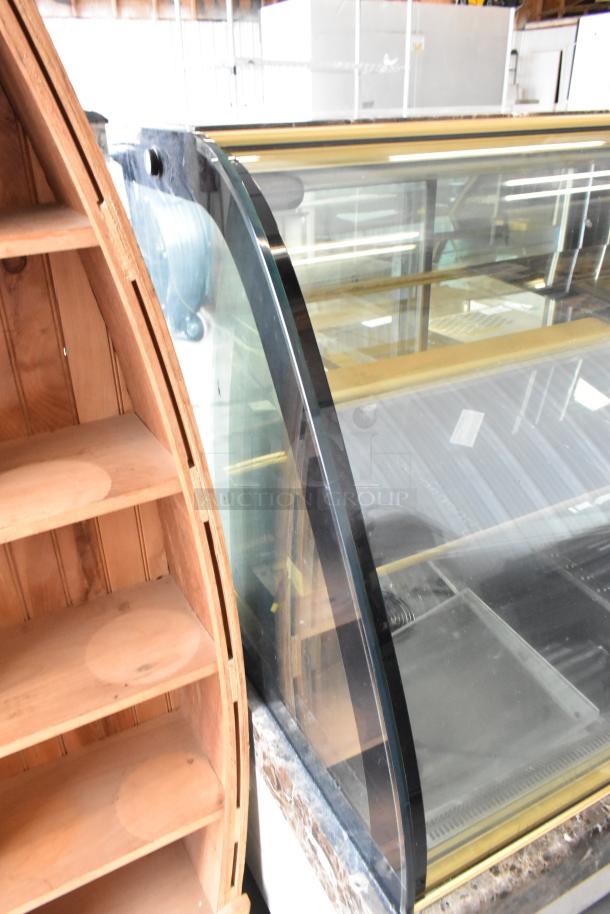 Kinco NSRM3 metal deli display case, floor style, commercial use, 110V, 1-phase. Features glass front, shelf interior.