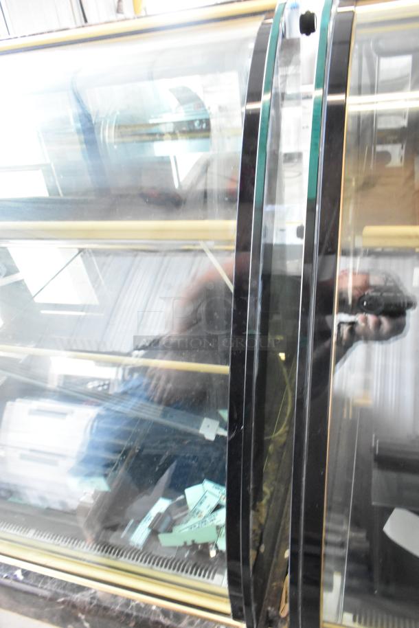 Kinco NSRM3 metal deli display case, floor style, glass panels, 110V, 1 phase, commercial use, good condition.