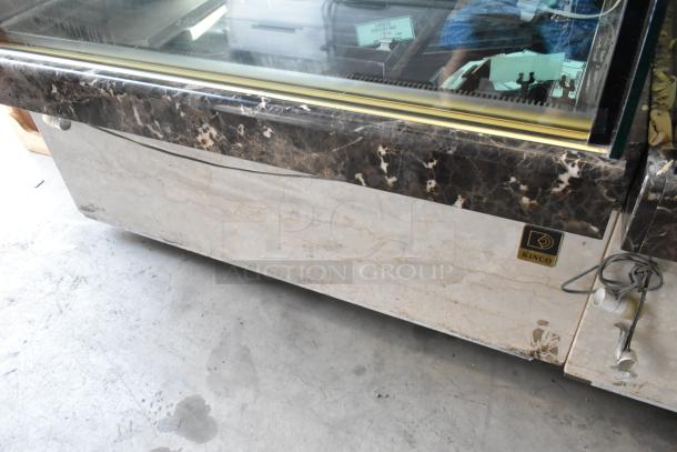 Kinco NSRM3 metal deli display case, marble design, 110 volts, 1 phase. Used condition with visible Kinco branding.