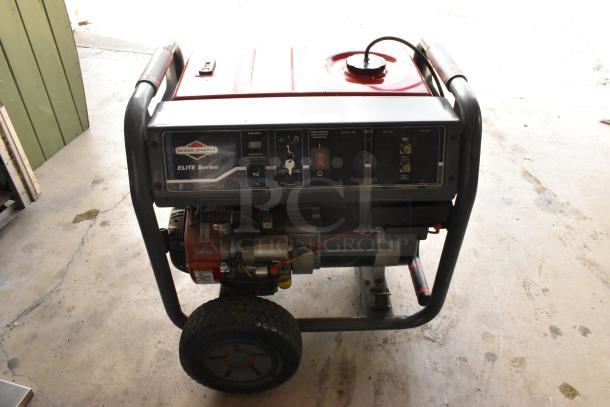 Briggs & Stratton Elite Series 030549 Generator with durable frame, control panel, and large wheels for easy transport.