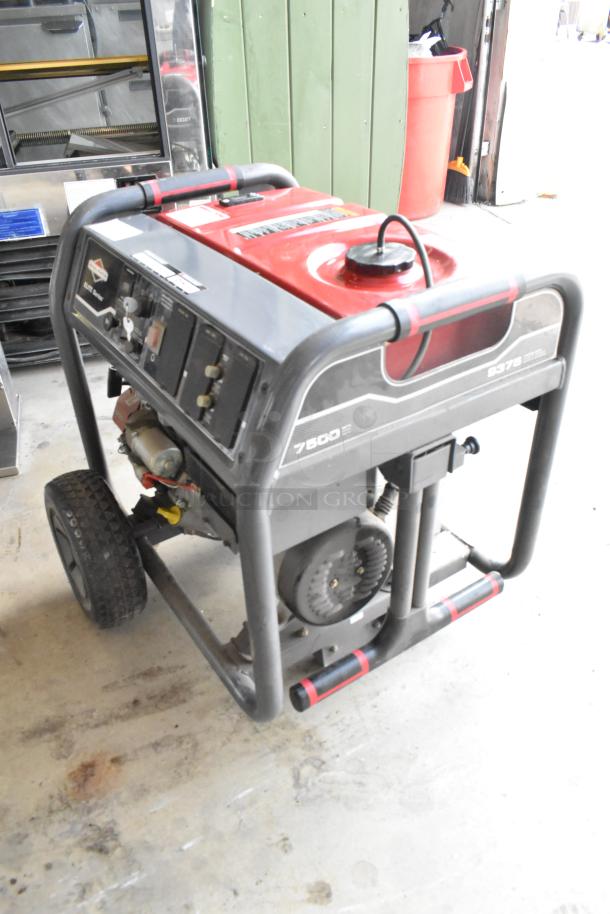 Briggs & Stratton Elite Series 030549 Generator, 7500 running watts, robust frame, red and black design, used condition.
