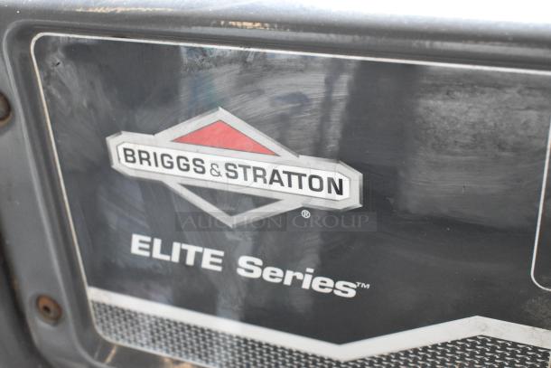 Briggs & Stratton Elite Series 030549 Generator, black casing, visible logo and series label, good condition.
