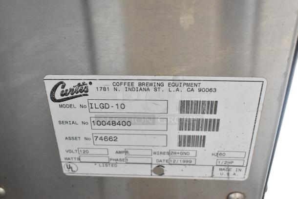 Curtis ILGD-10 stainless steel coffee grinder, 120V, 1-phase. Serial 10048400. Coffee brewing equipment label visible.
