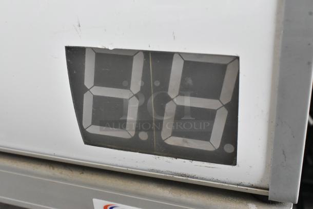 AHT Coolpoint CMV 50 metal mini cooler merchandiser, single door, 115 volts, 1 phase, showing front display section.