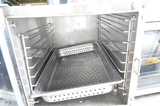 Southbend R2 RapidSteam stainless steel steam cabinet, single deck, 208V, 3-phase, perforated tray inside, clean condition.