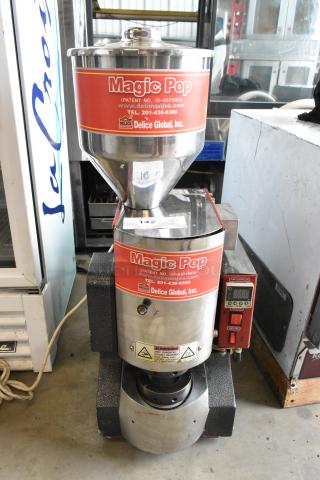 Magic Pop DMP-1 metal rice cake machine, 115V, 1 phase. Features brand label, warning signs, patent, and contact info.