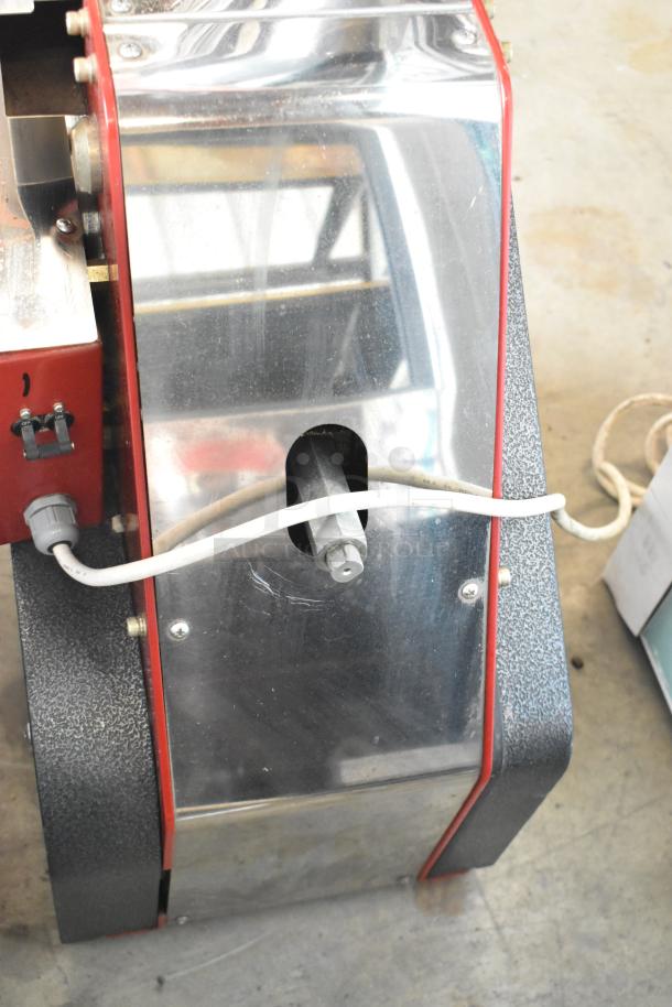 Magic Pop DMP-1 metal commercial rice cake machine, 115 Volts, 1 Phase, in used condition with visible wiring and metal finish.