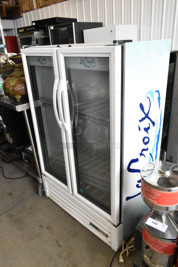 2019 True ZGDM-36SL-HC-LD metal 2-door reach-in cooler merchandiser with poly-coated racks, 115 volts, used.