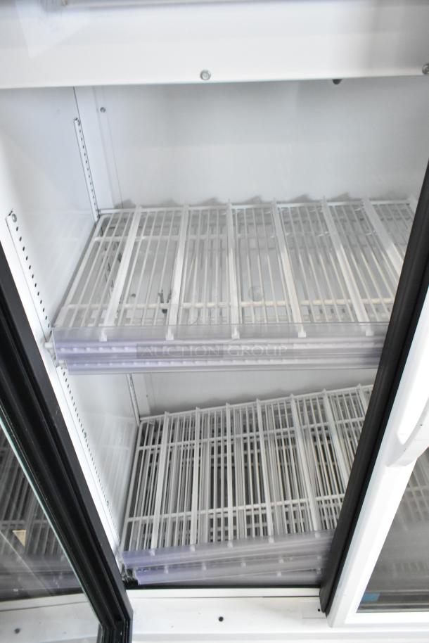2019 True ZGDM-36SL-HC-LD Commercial Cooler with poly-coated racks, 2 glass doors, 115V, pristine condition.