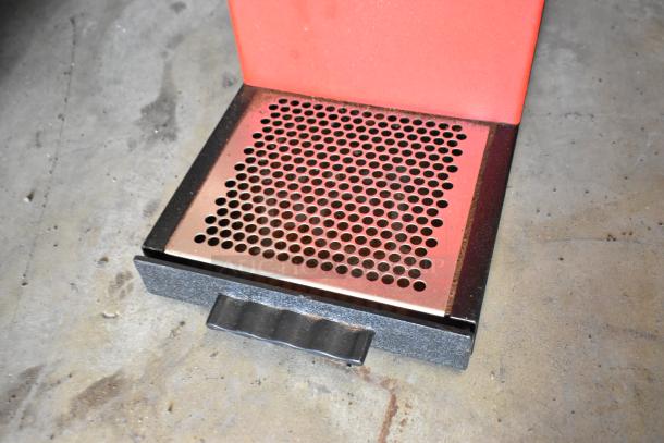 Bunn metal commercial countertop coffee bean grinder base, features a perforated metal tray. Suitable for 120 volts, 1 phase.