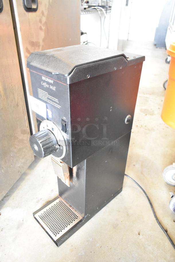 Bunn G3 HD metal commercial coffee grinder, black, used condition, 120V, 1 phase. Visible label and grind settings.