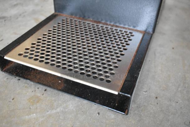 Bunn G3 HD commercial coffee grinder drip tray. Metal with perforated design, shows mild rust. Suitable for 120V, 1-phase use.