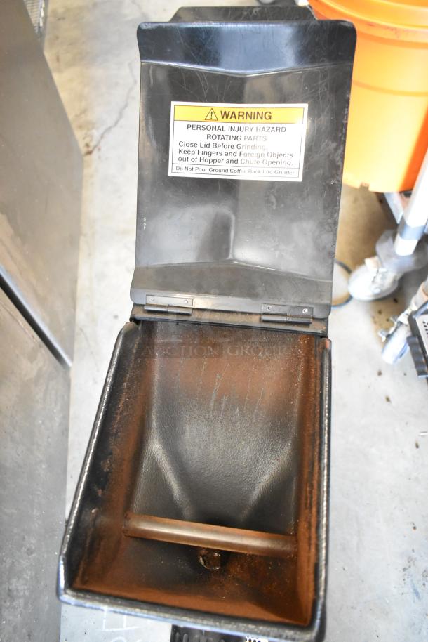 Bunn G3 HD coffee bean grinder, metal, commercial countertop model. Warning label on hopper lid. 120 Volts, 1 Phase.