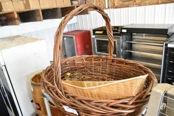Three items including a large woven basket, smaller basket, and Vector E123180 bug zapper; good condition, auction lot.