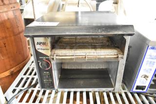 APW Wyott AT EXPRESS stainless steel conveyor toaster oven, 240 volts, 1 phase, used condition, visible controls and markings.