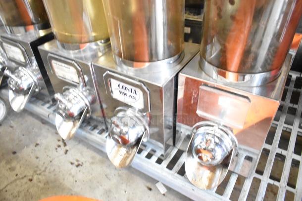 6 metal dry dispensers with chrome finish, Costa Rican label, used condition, ideal for bulk dispensing.