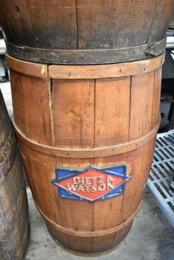 Wooden barrel with Dietz & Watson logo, visible age and wear, auction includes 4 barrels.