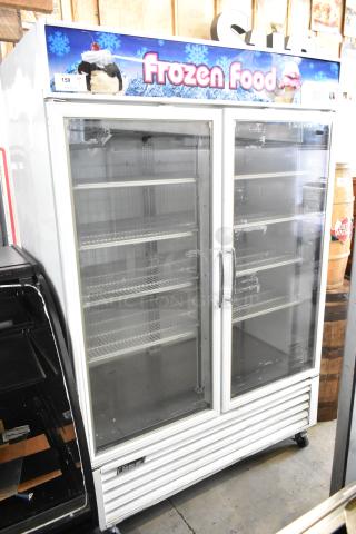 Turbo Air TGF-49F commercial 2-door freezer merchandiser with poly-coated racks, metal frame, and commercial casters. 115V, 1 Phase.