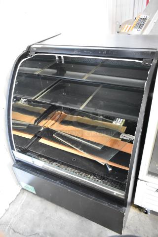 Structural Concepts HV38RSS metal floor-style open grab n go merchandiser, 120 volts, 1 phase. Visible wear on internal shelves.