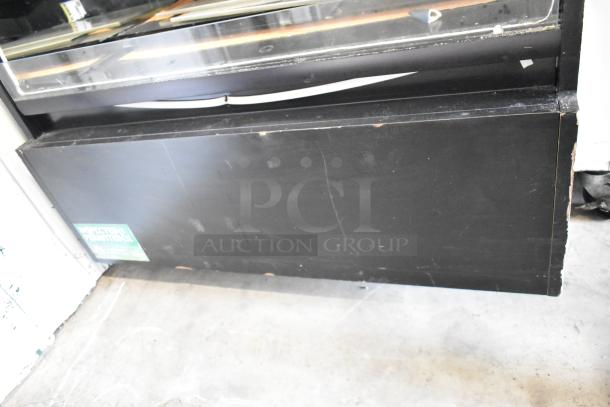 Structural Concepts HV38RSS open merchandiser, black metal floor style, 120V, 1 phase, minor wear visible.