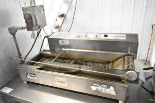 Belshaw Mark II Stainless Steel Commercial Countertop Donut Robot, visible wear, operational controls, and branding.