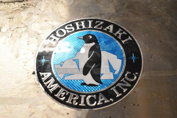 Hoshizaki RHZ-AAC logo; black penguin on blue background. Stainless steel commercial cooler.