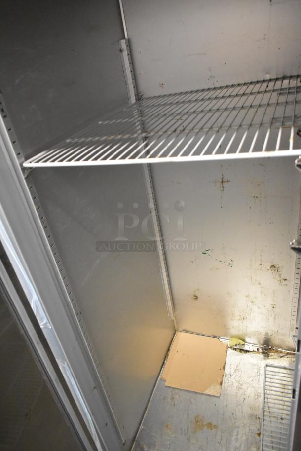 Hoshizaki RHZ-AAC stainless steel 2-door cooler with poly-coated racks, on commercial casters. Interior view shows shelving.