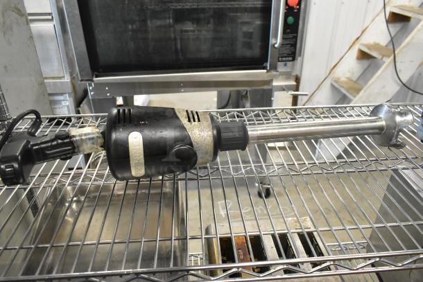 Waring WSB Commercial Immersion Blender, 120 Volts, 1 Phase. Black motor housing, stainless steel shaft, used condition.