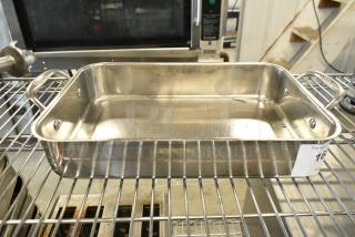 Cuisinart metal baking pan, rectangular, handles on sides, clean interior, minor scratches, auction label visible.