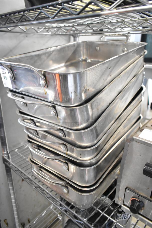 Stack of 8 Cuisinart metal baking pans, minimal wear, stainless steel, visible quantity label, ideal for bulk baking.
