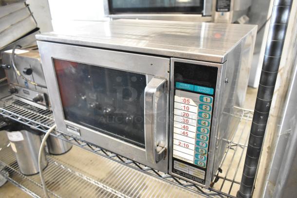 Sharp R-23GT-F stainless steel commercial microwave, 208/230V, 1 phase, with keypad and display, in used condition.