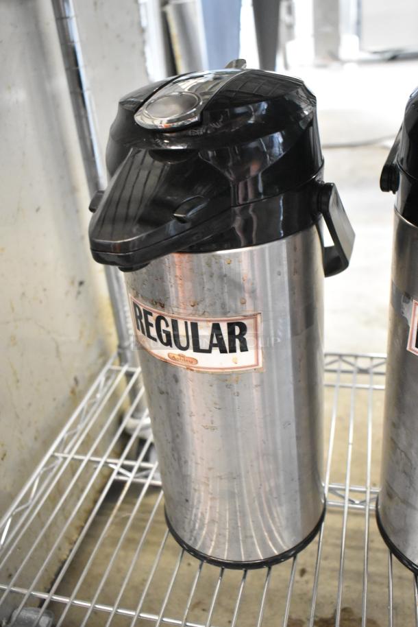 Three metal air pots with black lids, labeled "Regular." Good condition, stainless steel.