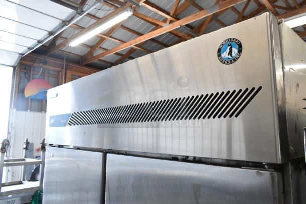 Hoshizaki FH2-AAC stainless steel 2-door reach-in freezer, poly-coated racks, commercial casters, 115V, 1 phase.