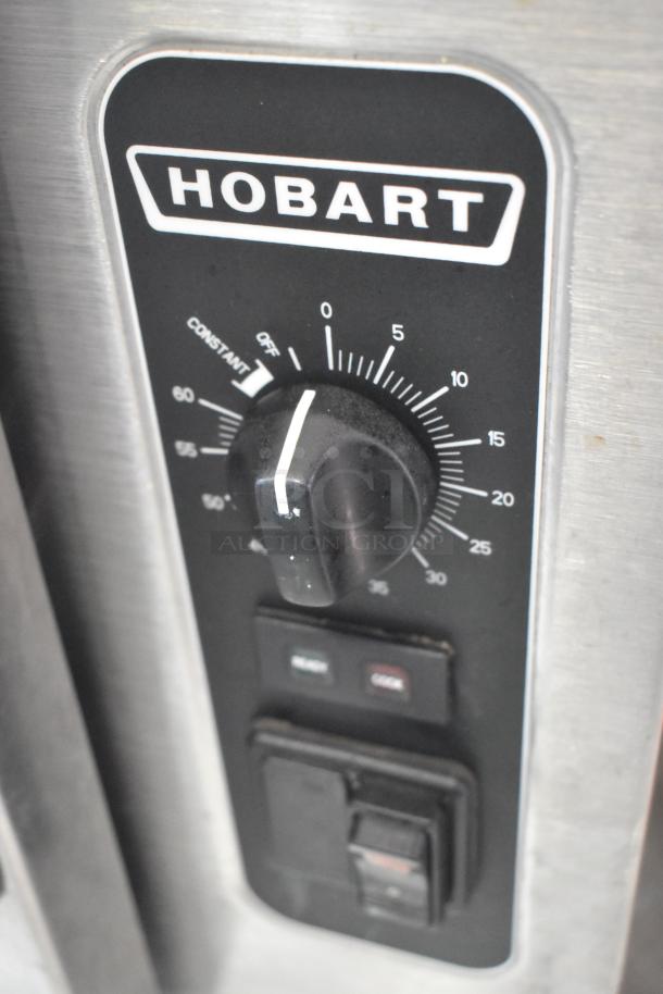 Hobart HC24EA5 steam cabinet control panel, showing settings dial on stainless steel appliance.