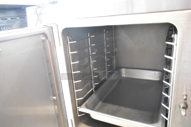 Hobart HC24EA5 steam cabinet, stainless steel, single deck, electric, 208/240V, interior view with tray.
