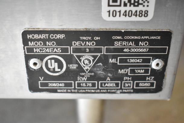 Hobart HC24EA5 stainless steel steam cabinet label showing model number, serial number, and electrical specifications.
