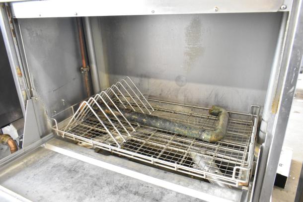 Hobart UW50 stainless steel commercial front load utensil washer with split door, showing interior racks. 208V, 3 phase.