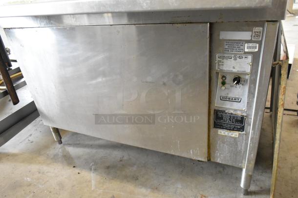 Hobart UW50 stainless steel commercial front load utensil washer with split door design, visible labels, 208V, 3 phase.