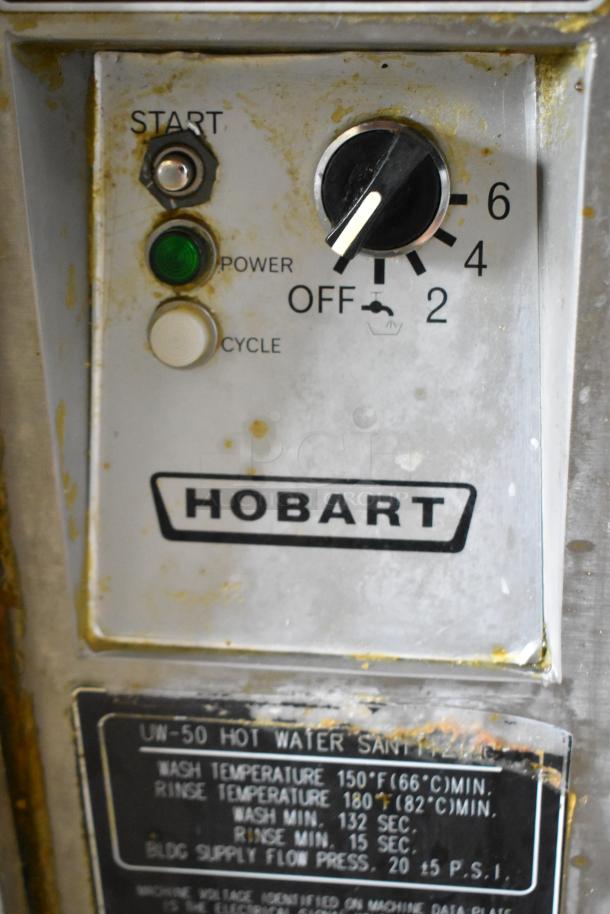 Hobart UW50 stainless steel utensil washer control panel with start switch, power indicator, cycle button, and temperature label.