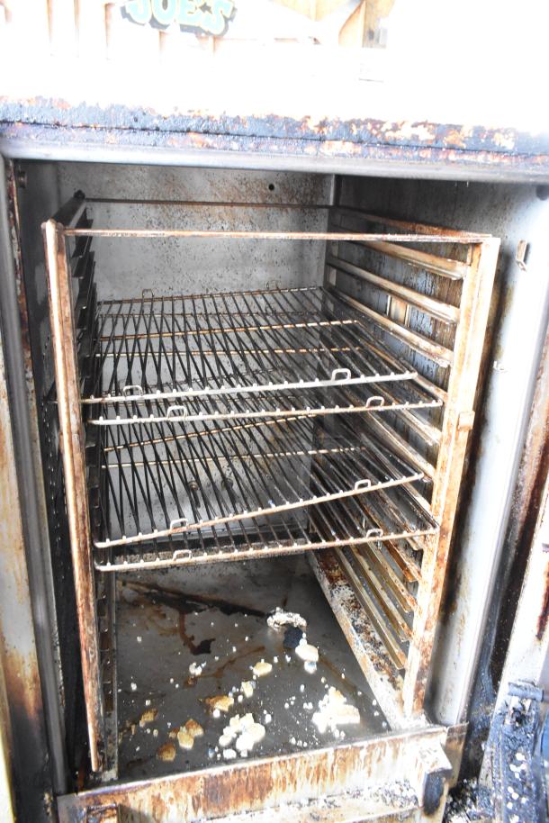 Alto Shaam 12.20ESI-SK combi convection oven, stainless steel, electric, visible wear and residue, 3-phase, 208-240V.