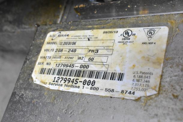 Alto Shaam 12.20ESI-SK oven label showing model, voltage 208-240, 3-phase, serial number, UL certifications, and service number.